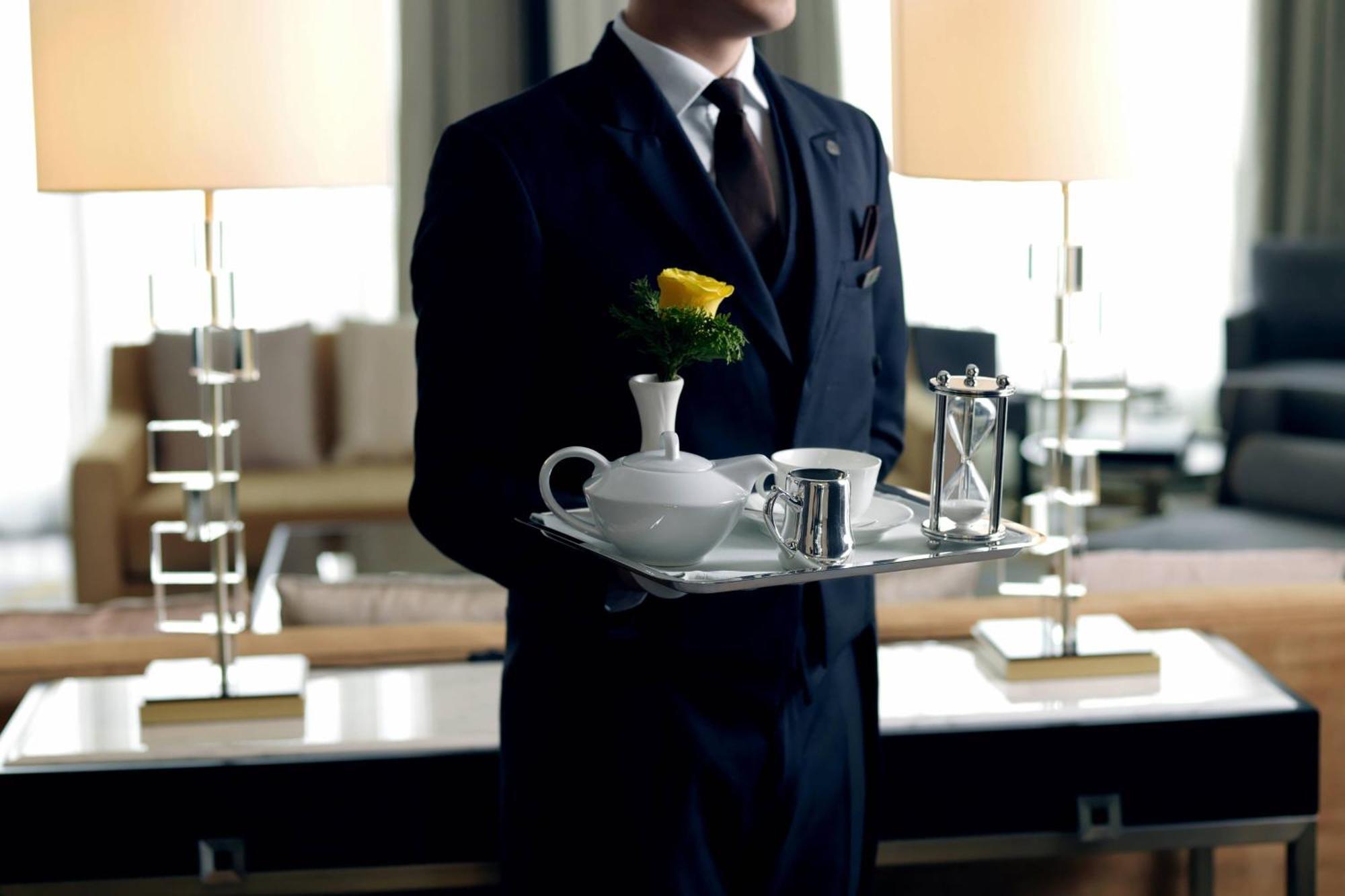 The St. Regis Astana Hotel Exterior foto A butler at the Four Seasons Hotel, Seoul